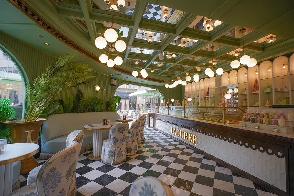 Ladurée Arkan Plaza restaurant interior in Sheikh Zayed – luxurious Parisian decor with pastel tones, gold accents, and elegant seating at Arkan Plaza Cairo