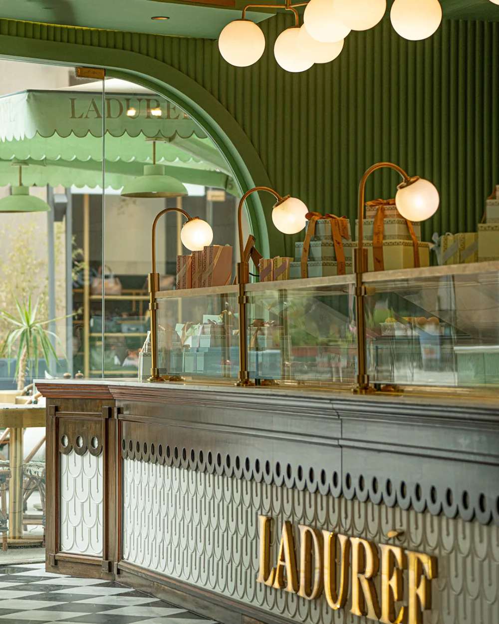 Signature rainbow assortment of Ladurée macarons in classic and exotic flavors at Arkan Plaza branch Sheikh Zayed – iconic French patisserie in Cairo